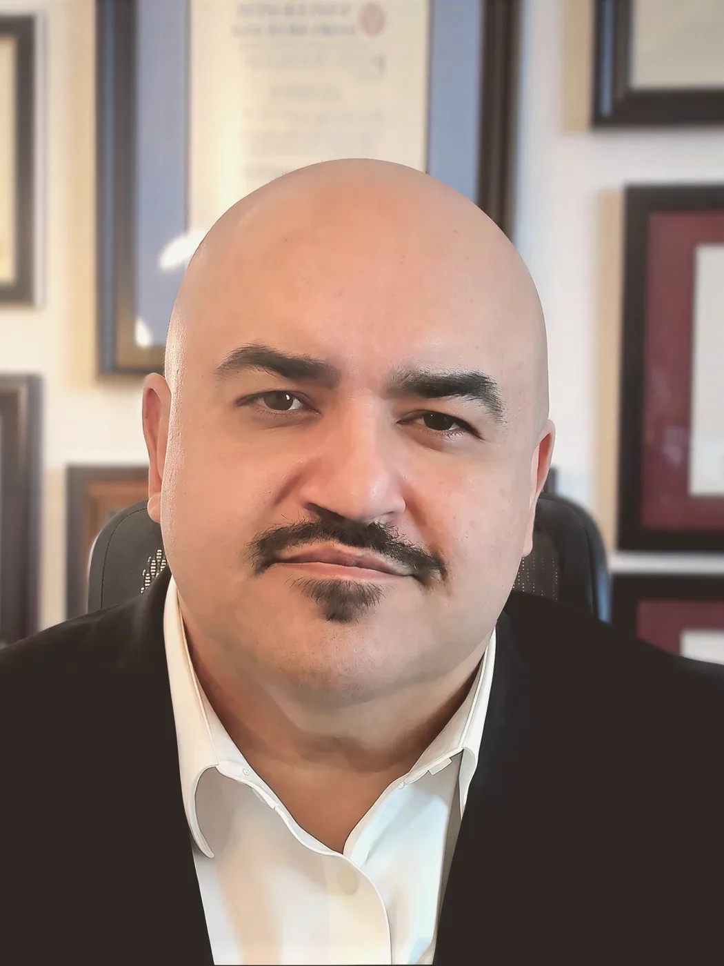 Dr. Angelo Sadeghpour in his office
